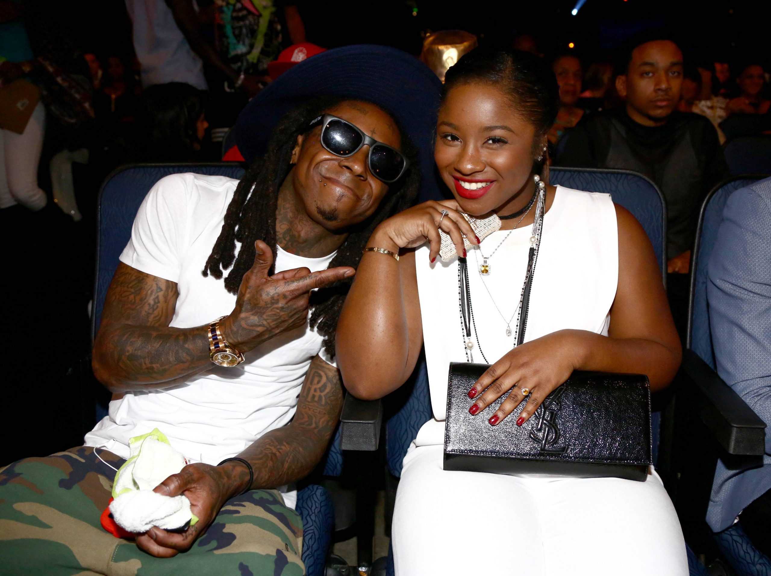 Reginae Carter and Lil' Wayne together (Credits: BET)