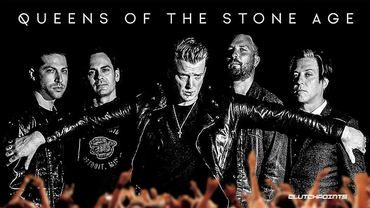 Josh Homme with the members of the band "Queens of the Stone Age," that he founded.